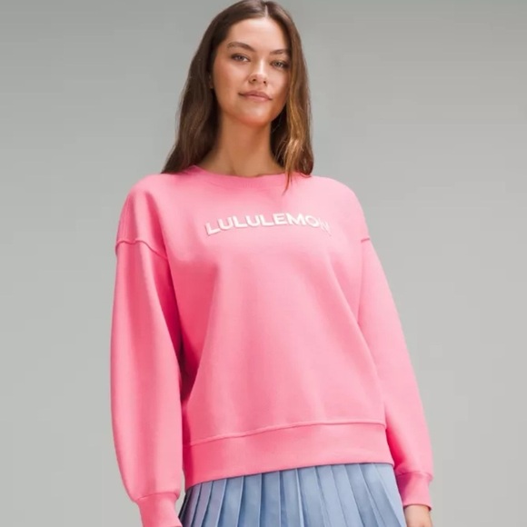 Lululemon Wordmark Scuba Oversized Fleece Pullover Sweatshirt Sakura Pink ML NWT - Picture 1 of 9